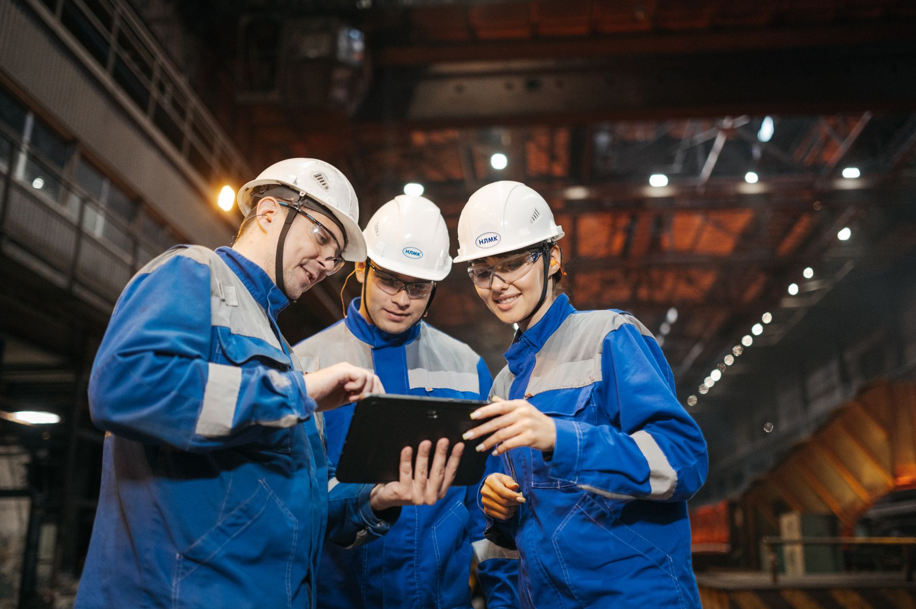 Industrial engineers reviewing work together
